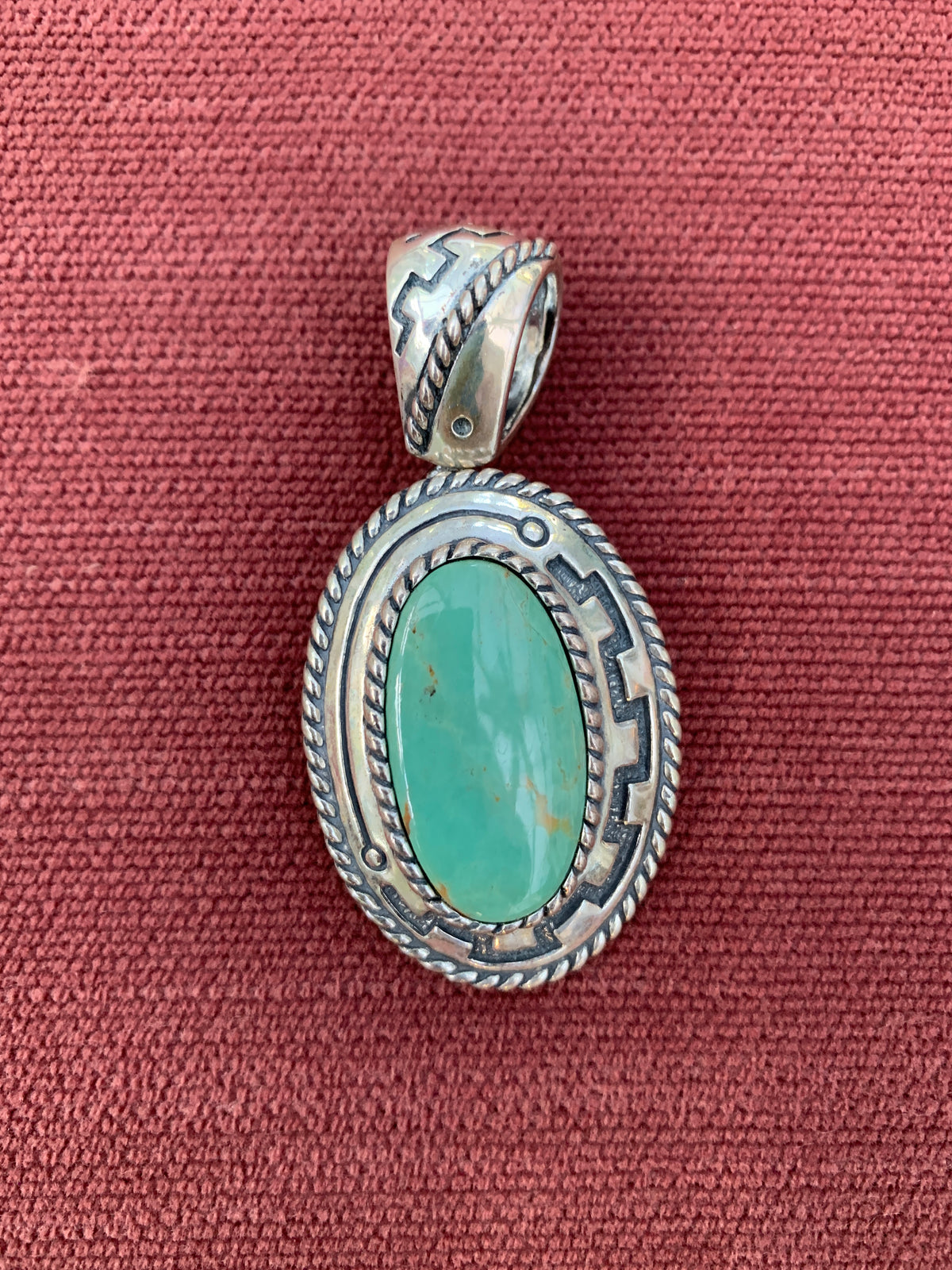 Native American Style Sterling Silver Turquoise Oval Pendant with Rope Design