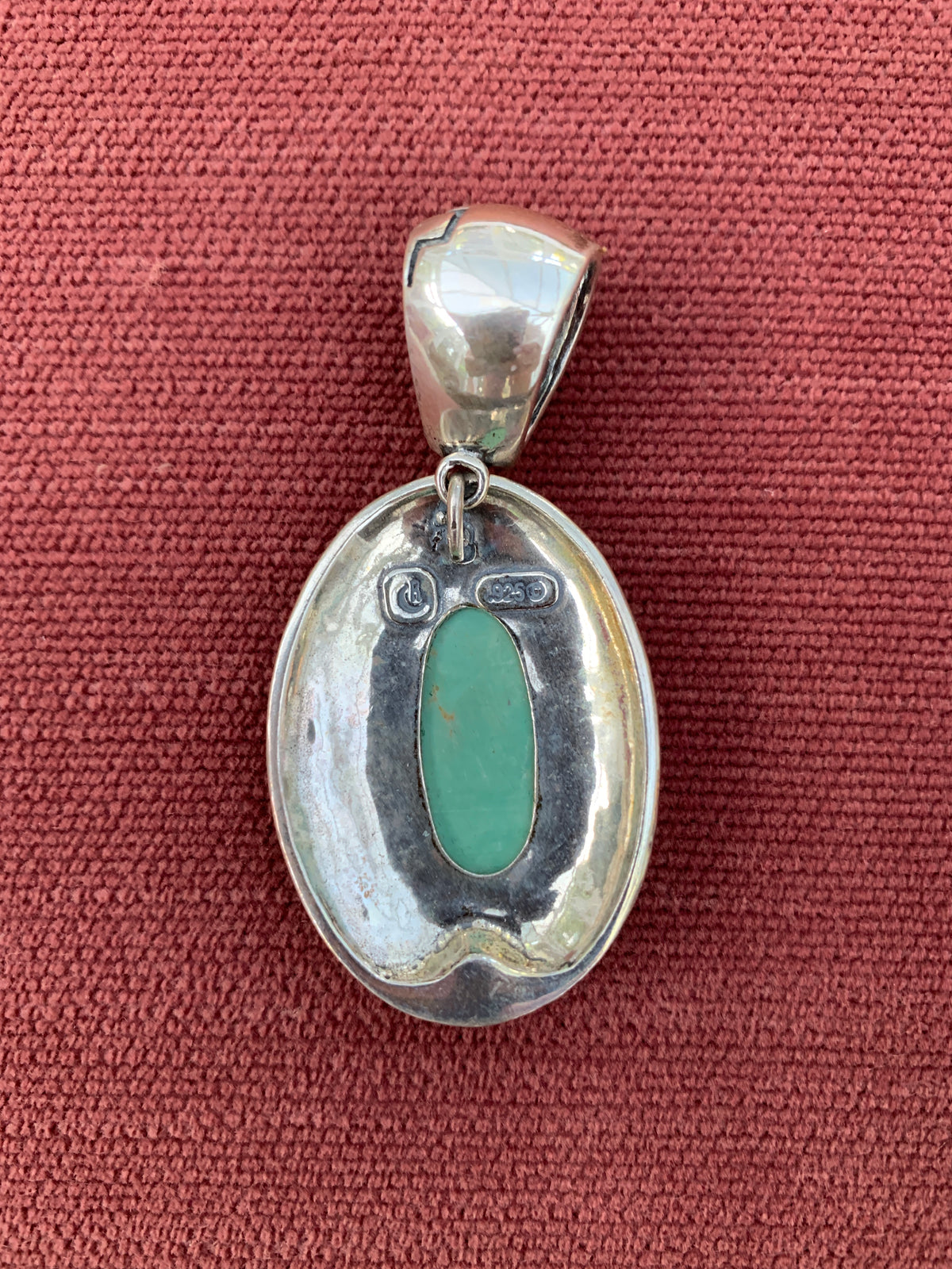 Native American Style Sterling Silver Turquoise Oval Pendant with Rope Design