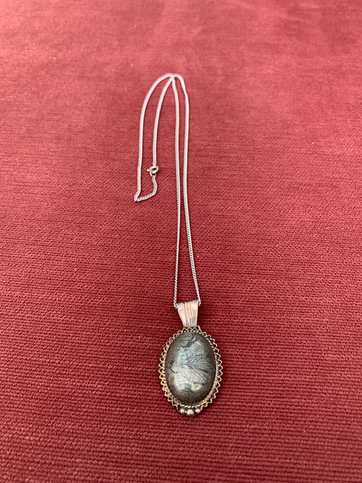 Oval Labradorite Cabochon Pendantwith Scalloped Streling Silver Setting