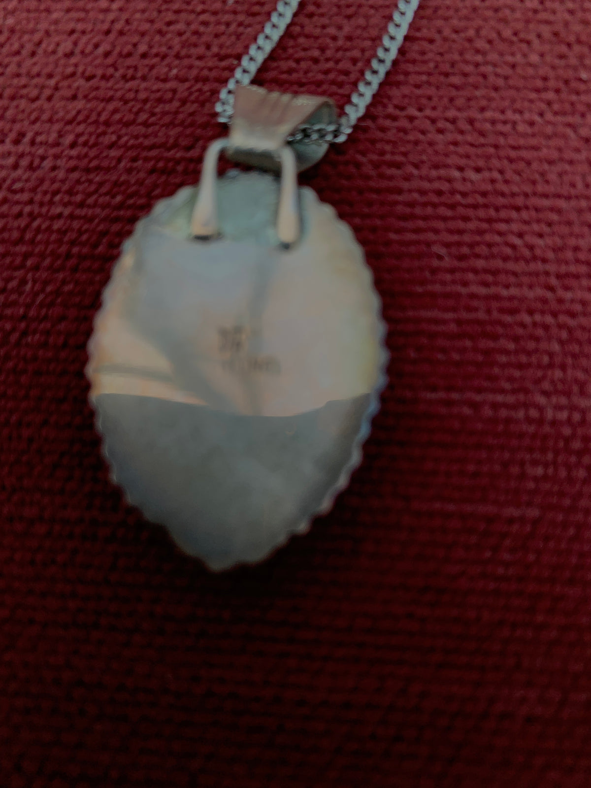 Oval Labradorite Cabochon Pendantwith Scalloped Streling Silver Setting